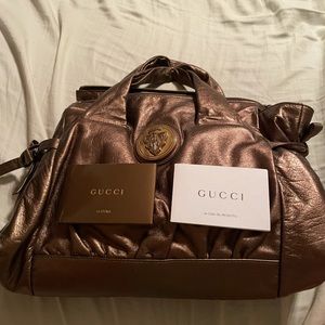 Gold small purse never worn still has tissue